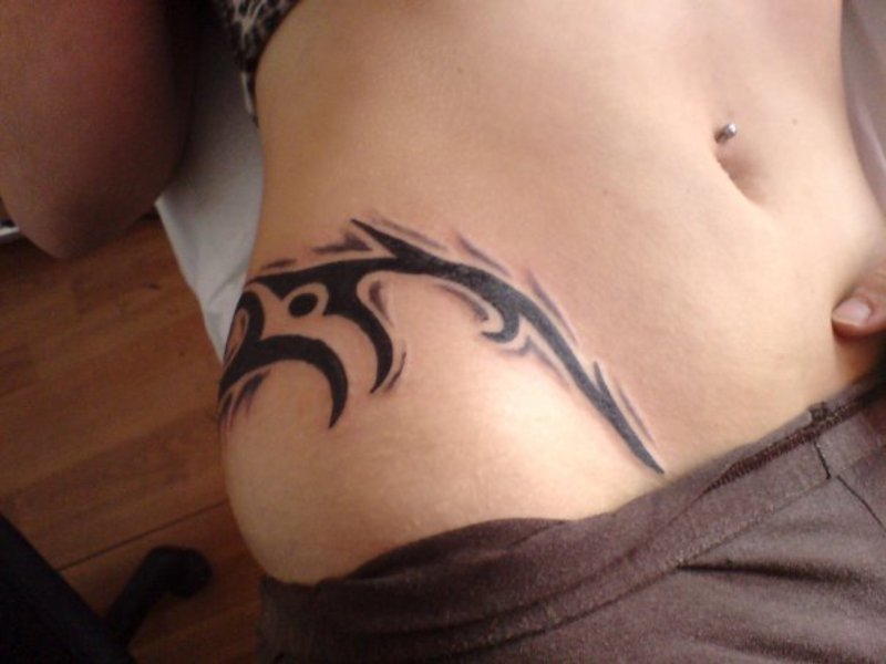 Outstanding Tribal Design Tattoo On Right Hip For Girls
