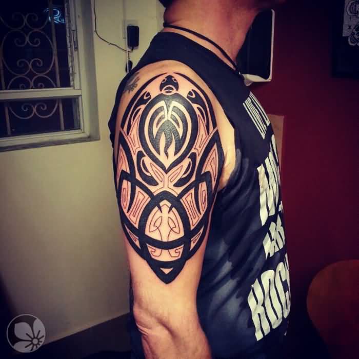 Outstanding Tribal Turtle Tattoo On Right Half Sleeve