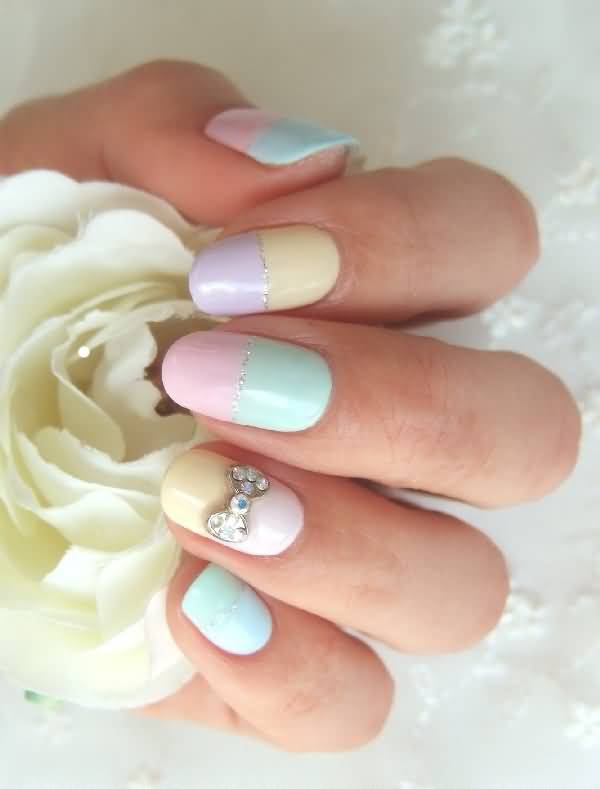 Pastel Nail Art With Accent Metallic 3d Bow Design