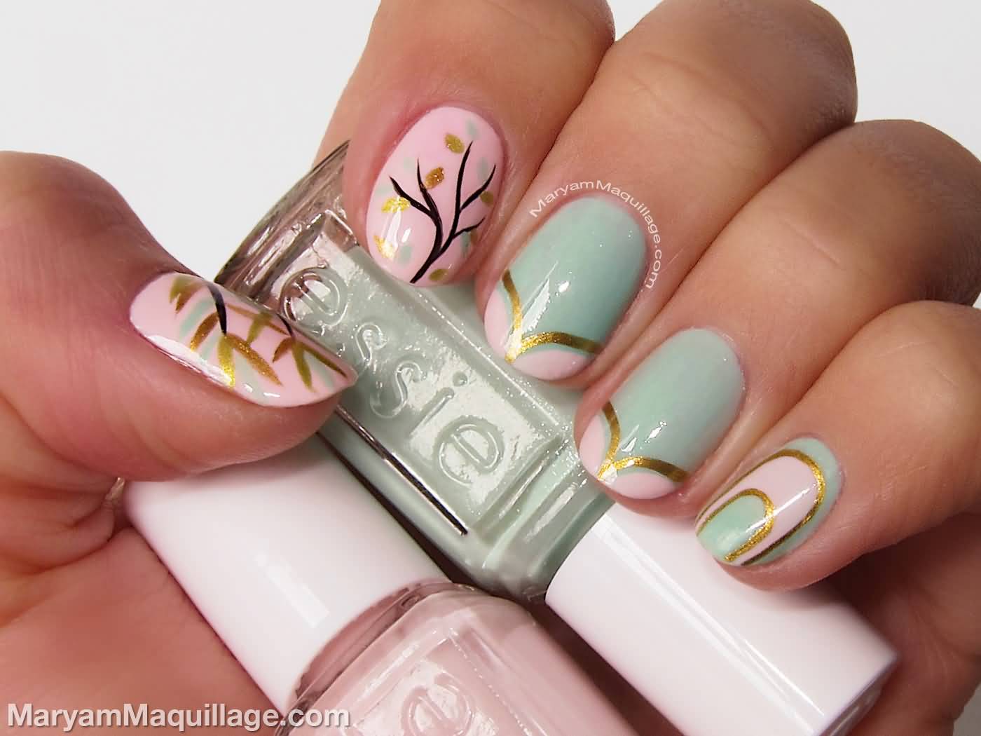 Pastel Nail Art With Golden Stripes And Tree Design