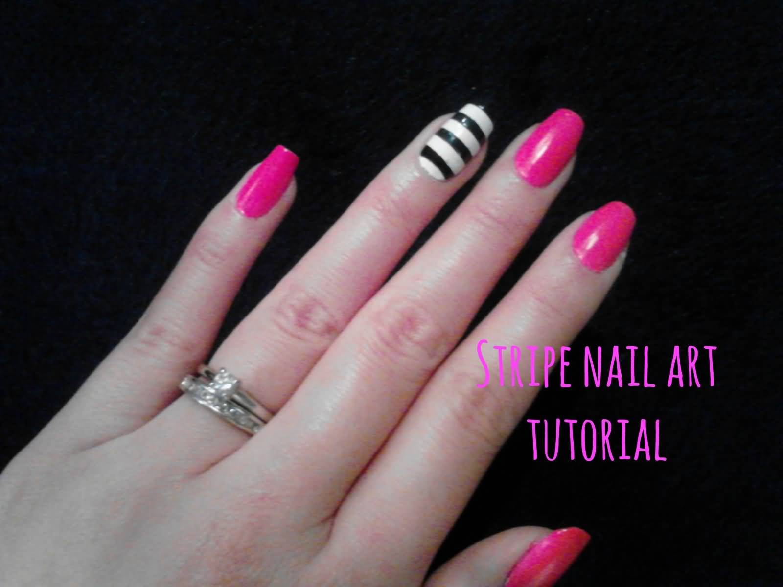 Pink Nails With Accent Black And White Stripes Nail Art