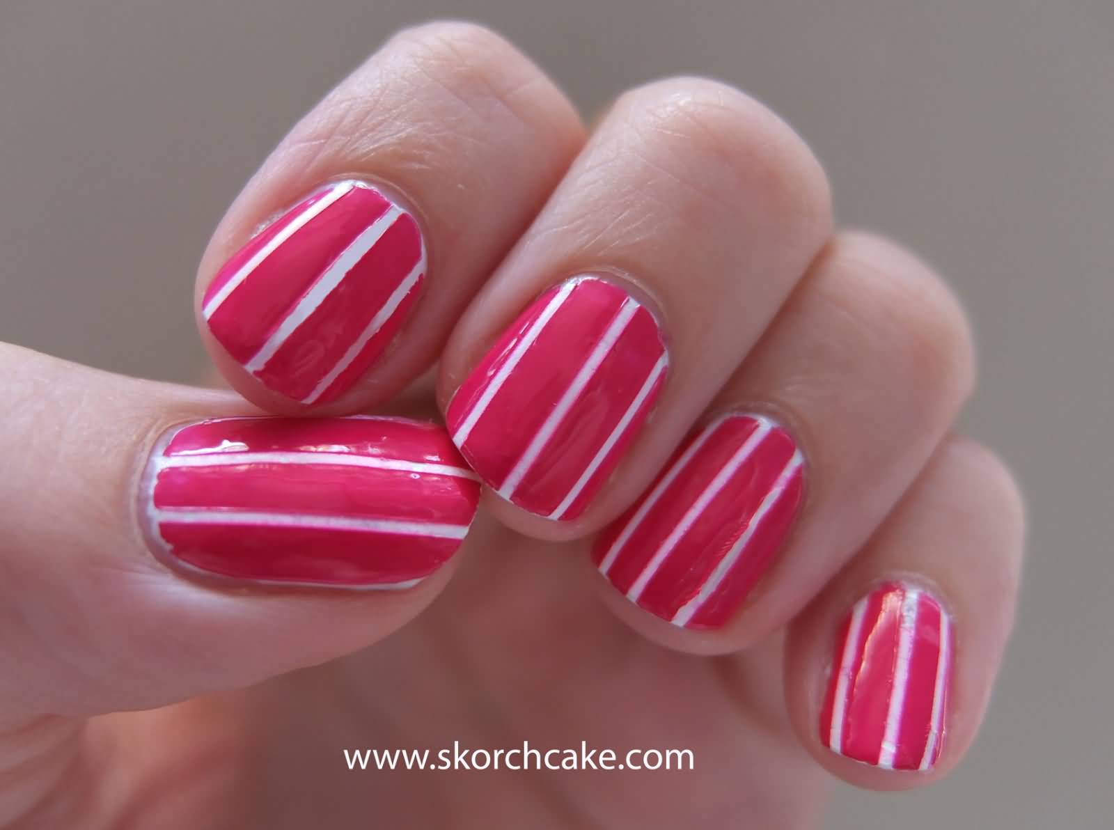 Pink Nails With White Stripes Nail Art