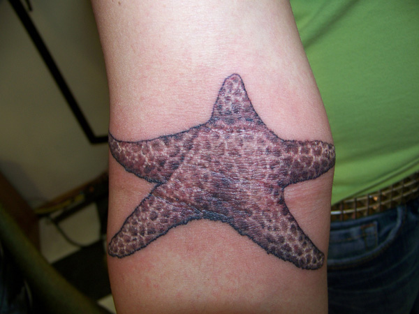 Plain Starfish Tattoo On Forearm