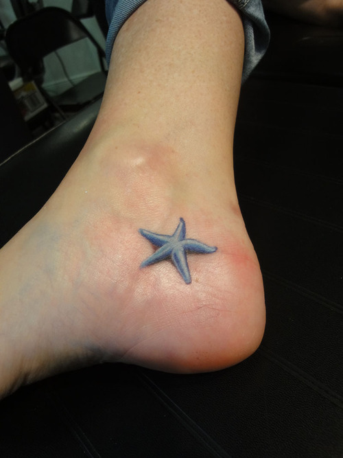 Realistic Blue Starfish Tattoo On Foot