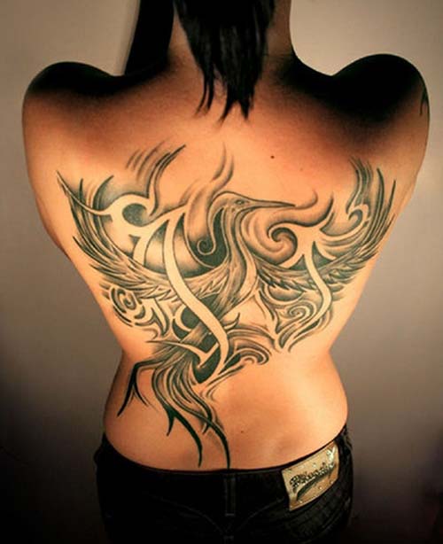 Realistic Colored Tribal Design With Bird Tattoo On Full Back For Women