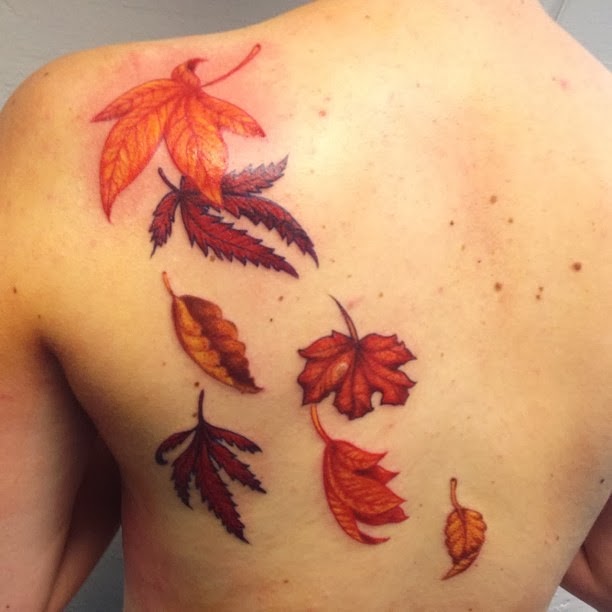 Realistic Falling Leaves Fall Tattoo On Upper Back