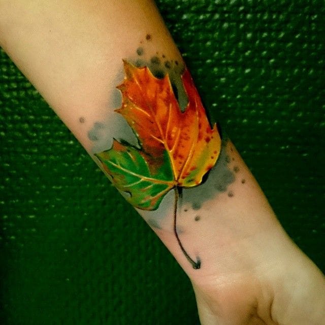 Realistic Maple Fall Leaf Tattoo On Left Wrist