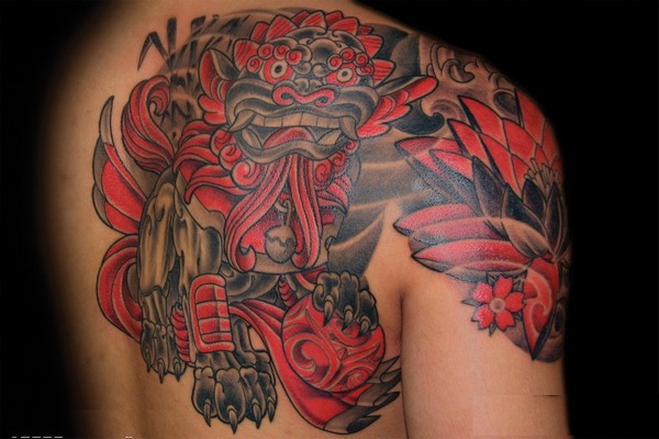 Red And Grey Color Foo Dog Tattoo On Upper Back