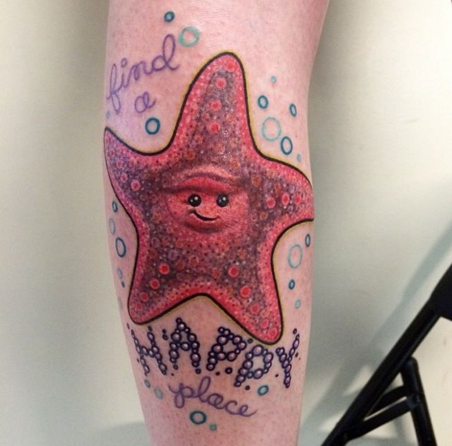Red Smiley On Starfish With Lettering Tattoo On Arm Sleeve