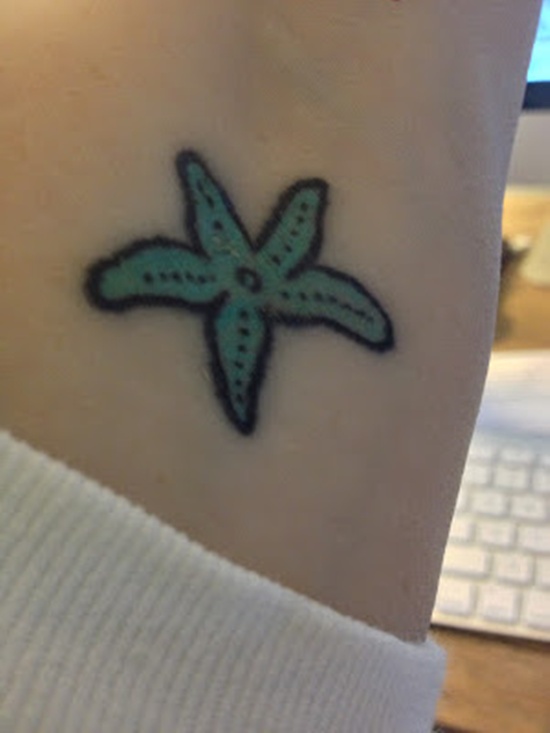 Simple Green Starfish Tattoo On Forearm