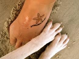 Simple Grey Ink Starfish Tattoo On Foot