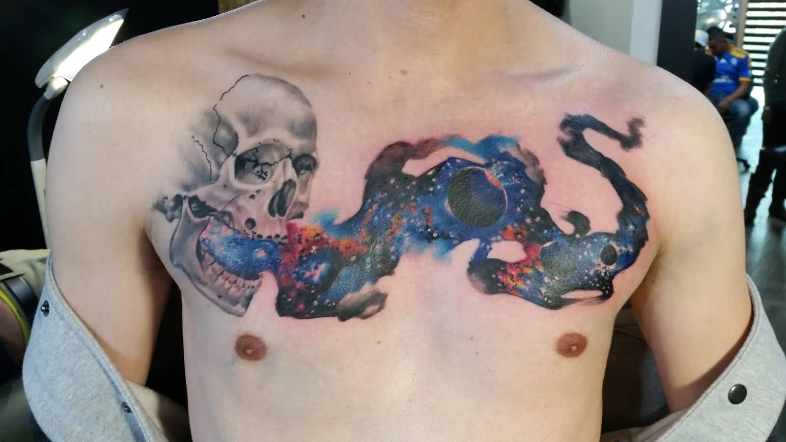 Skull and Universe Tattoo On Man Chest