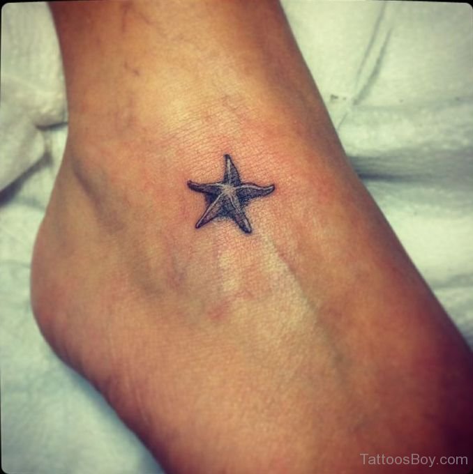 Small Grey Starfish Tattoo On Foot