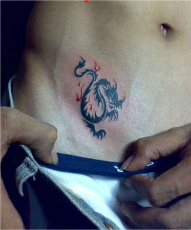Small Tribal Dragon Tattoo On Hip