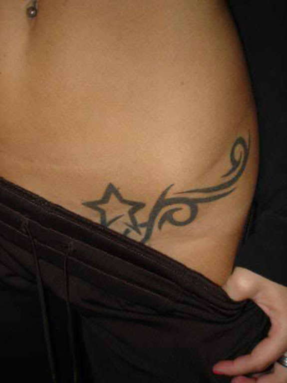 Small Tribal With Star Tattoo On Left Hip