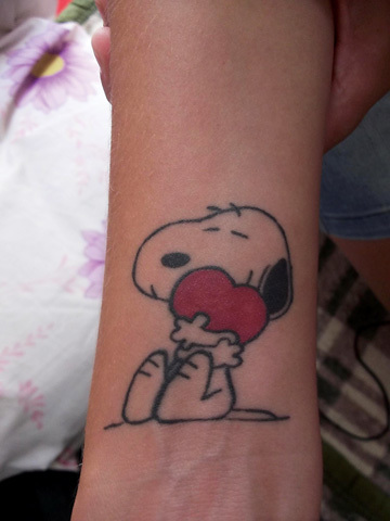 Snoopy Hug Red Heart Tattoo On Forearm