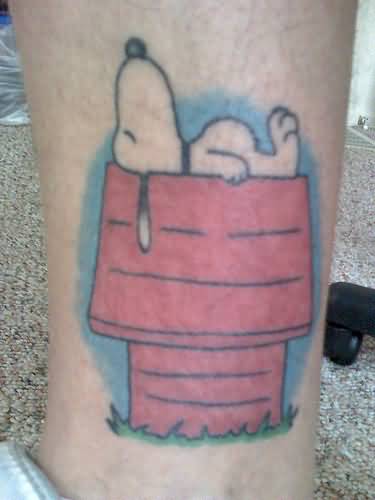 Snoopy Sleeping On Red Hut Tattoo
