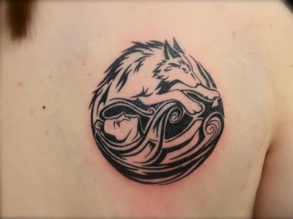 Spectacular Black And Grey Wolf And Cinderella Making Circle Tribal Tattoo