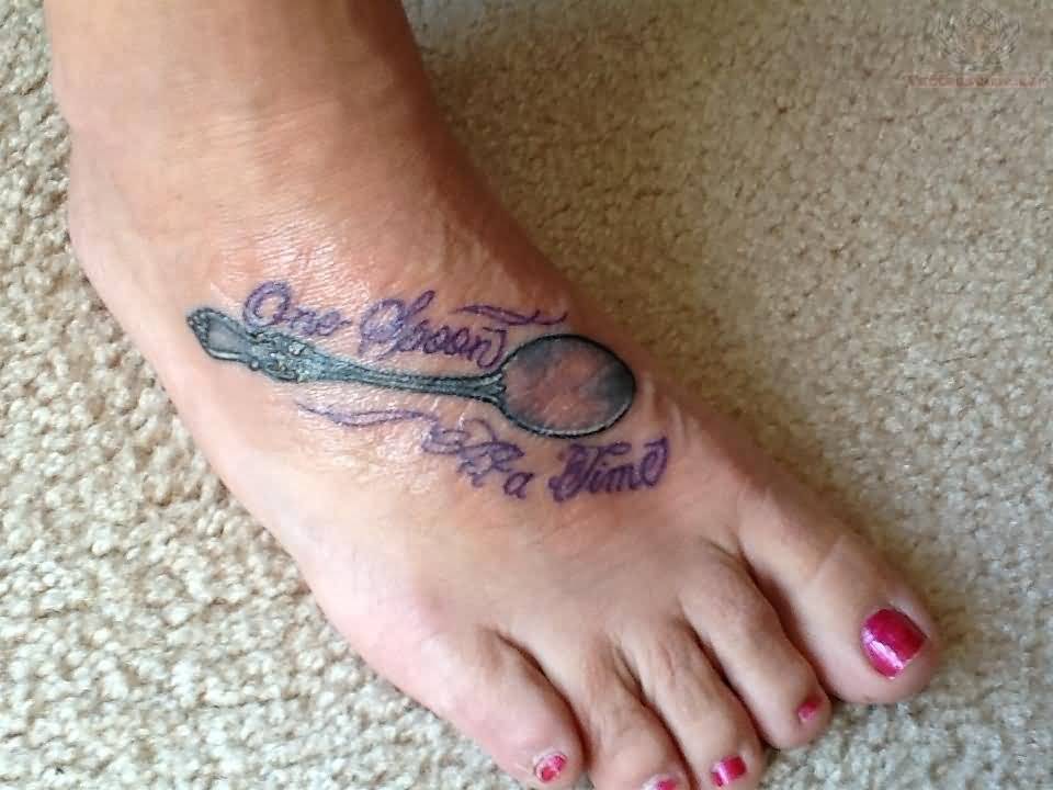 Spoon With Lettering Tattoo On Foot