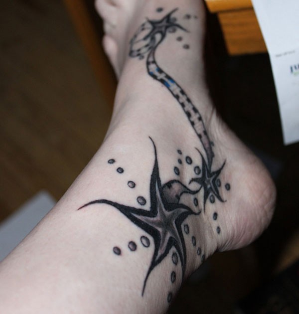 Stunning Black Ink Starfish With Bubbles Tattoo On Ankle And Foot