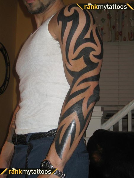 Stunning Full Sleeve Tribal Design Tattoo For Men