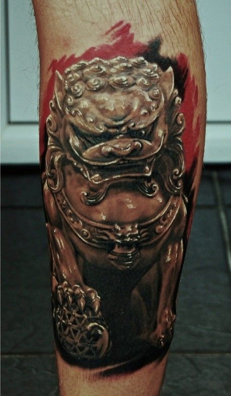 Superb Black And Grey Ink Foo Dog Tattoo On Back Leg By Alesksandras Kuznecovas