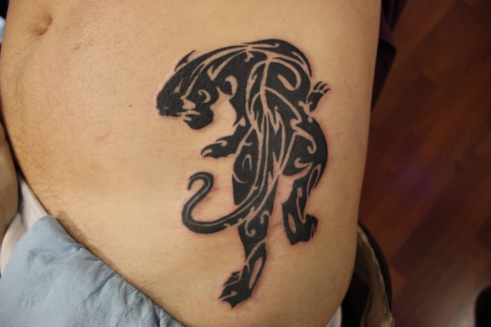 Terrific Tribal Panther Small Tattoo On Left Side Rib