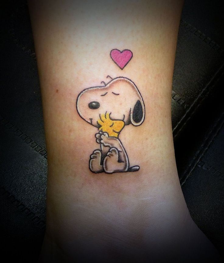 Tiny Heart And Snoopy Tattoo On Leg