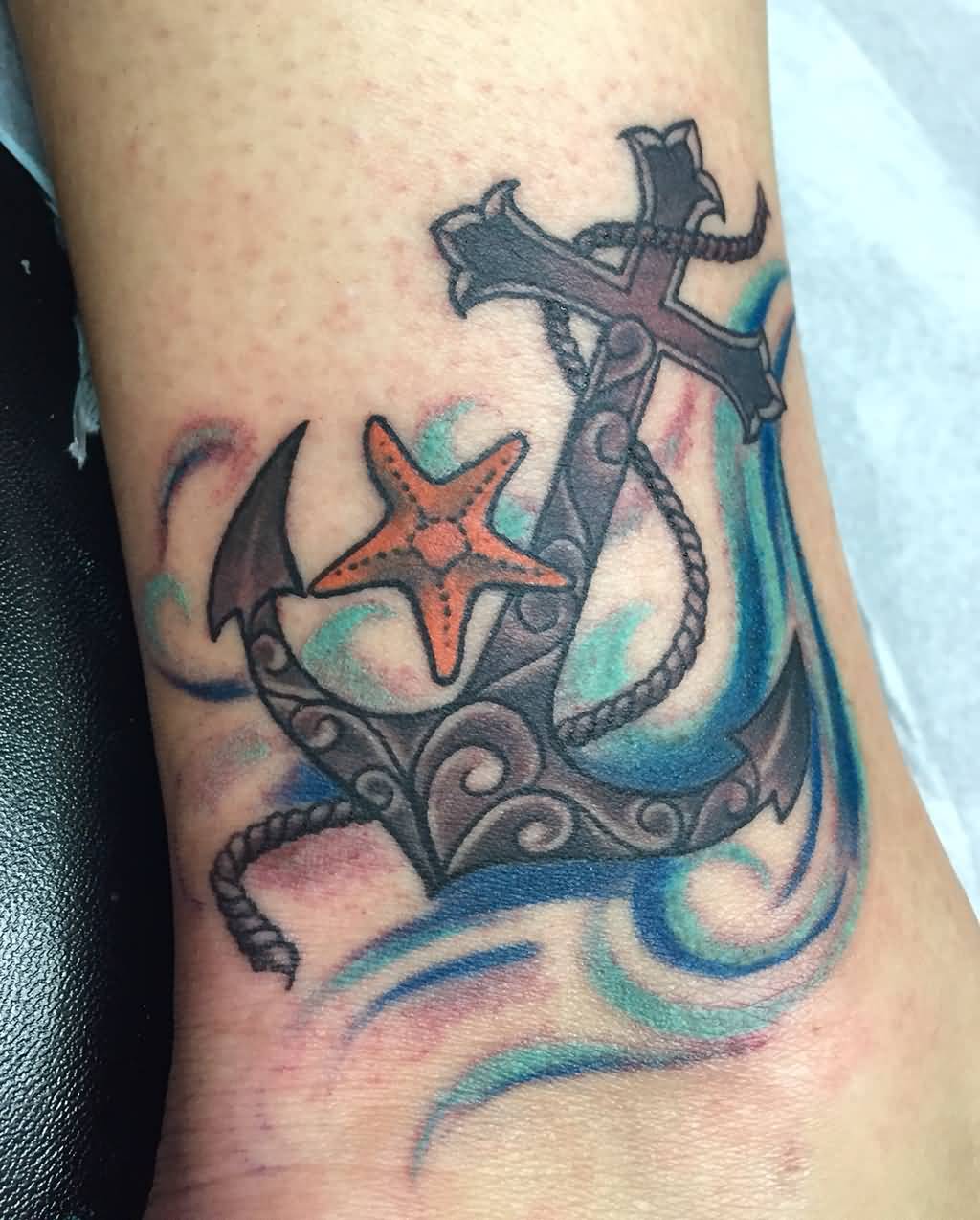Traditional Starfish With Cross Shaped Anchor Tattoo