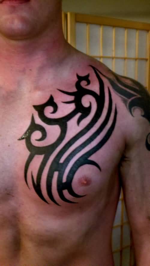 Tribal Design Tattoo On Chest For Men