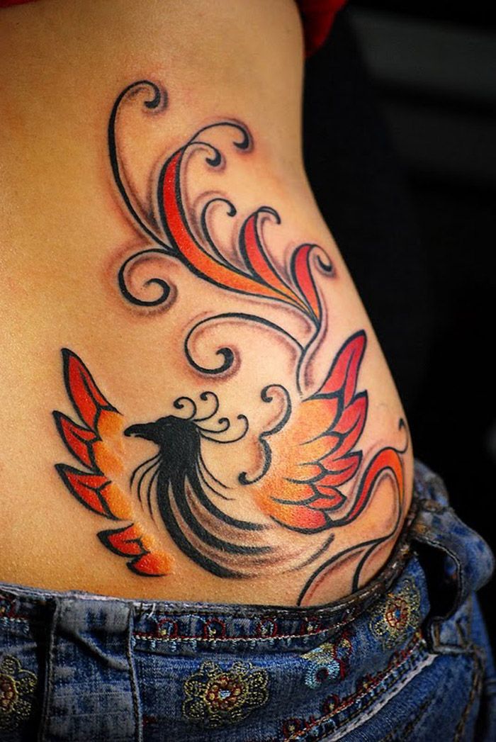 Tribal Phoenix With Red Leaves Tattoo On Side Rib For Women