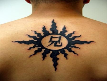 Tribal Sun Tattoo On Upper Back For Men