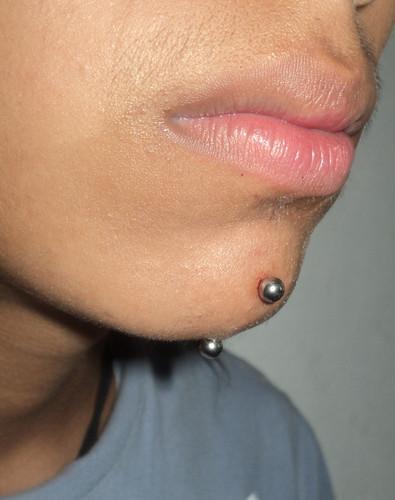 Vertical Silver Barbell Chin Piercing Picture
