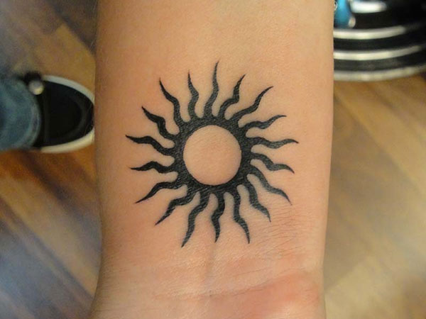 Very Nice Tribal Sun Tattoo On Wrist