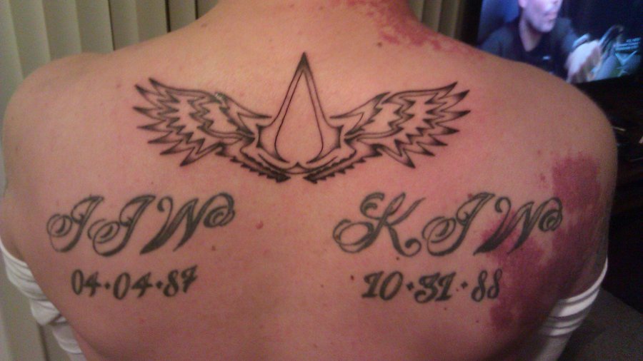 Winged Assassins Creed Tattoo On Upper Back by Edub02