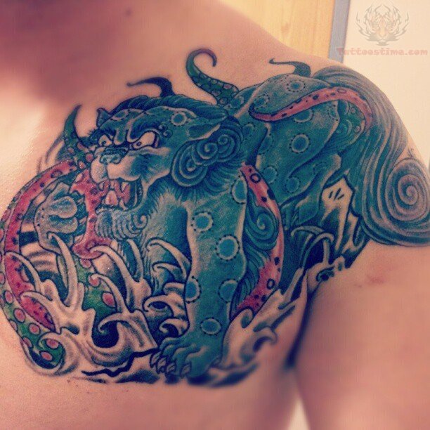 Wonderful And Colorful Foo Dog Tattoo On Left Chest To Shoulder