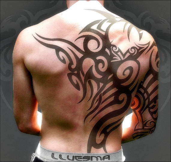 Wonderful Tribal Design Tattoo On Back To Right Half Sleeve