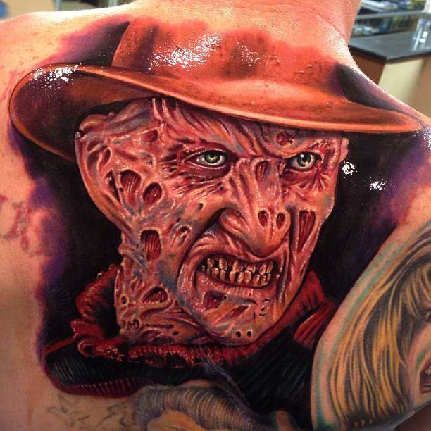 Amazing 3D Red Freddy Krueger Portrait Tattoo On Upper Back