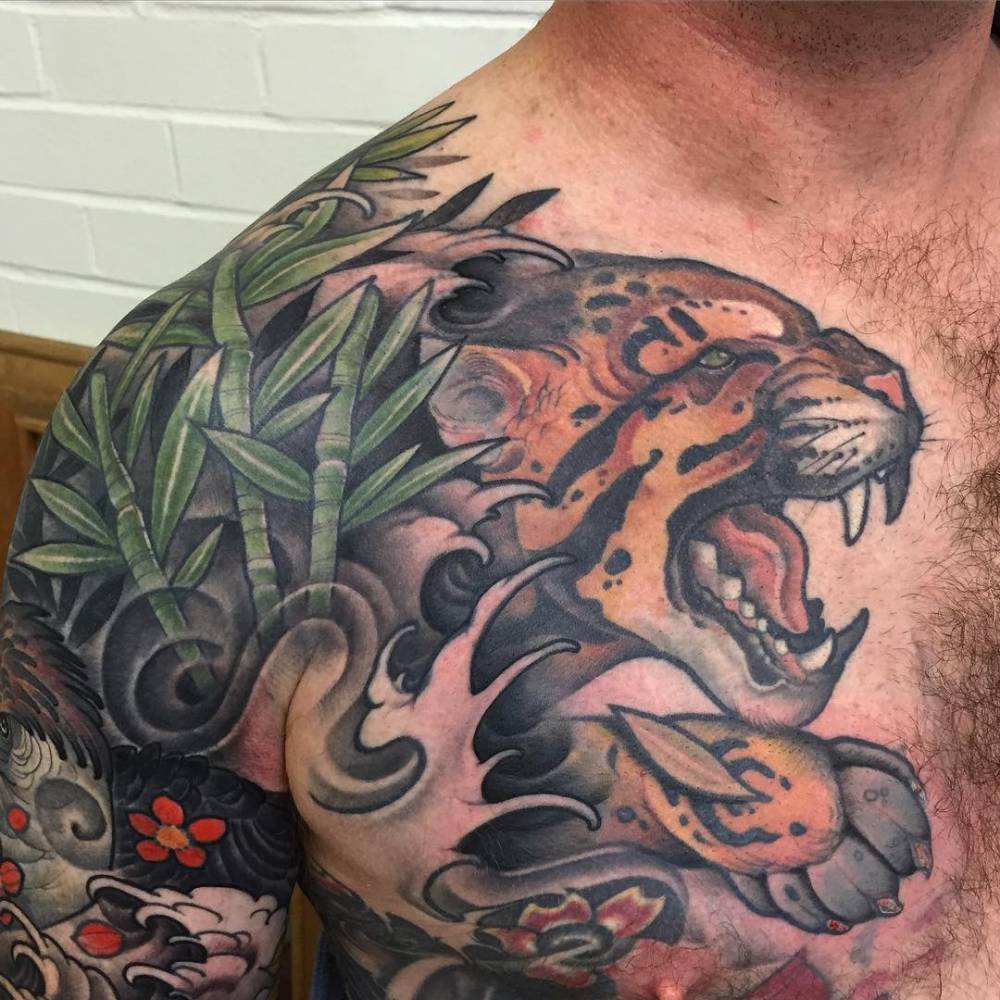 Amazing Angry Jaguar Tattoo On Chest And Shoulder