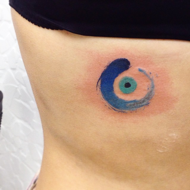 Amazing Blue Evil Eye Tattoo On Side Rib