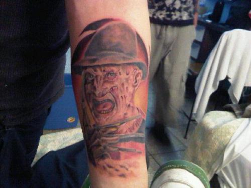 Angry Red And Grey Freddy Krueger Face Tattoo