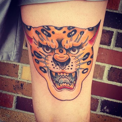 Angry Traditional Jaguar Tattoo On Thigh