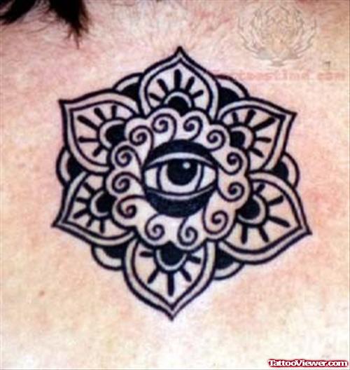 Attractive Evil Eye On Flower Tattoo