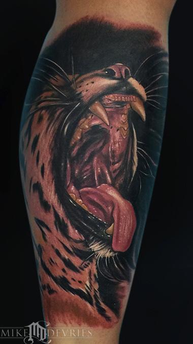 Awesome Black And Grey Jaguar Opening Mouth Tattoo