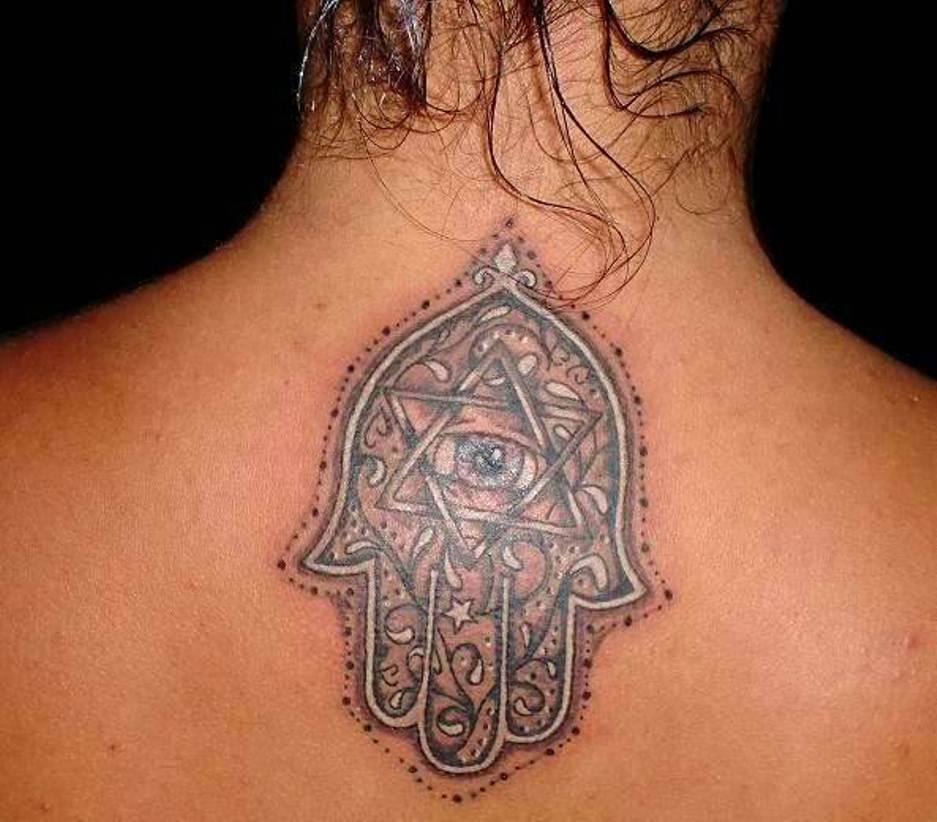 Beautiful Evil Eye On Hand Tattoo On Upper Back