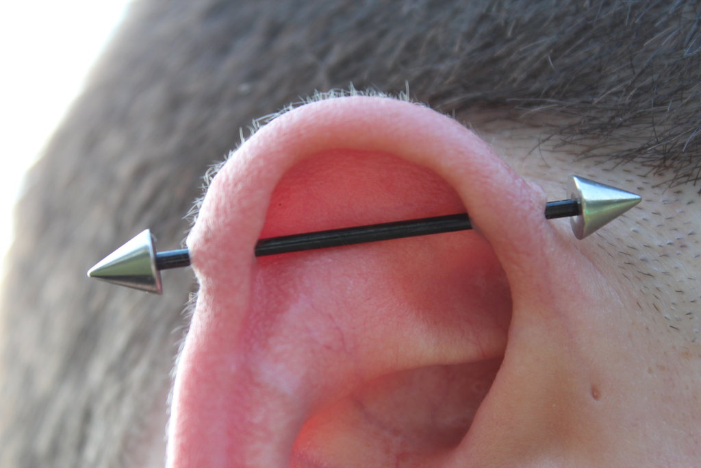 Beautiful Industrial Piercing With Spike Barbell by Reddefectstock