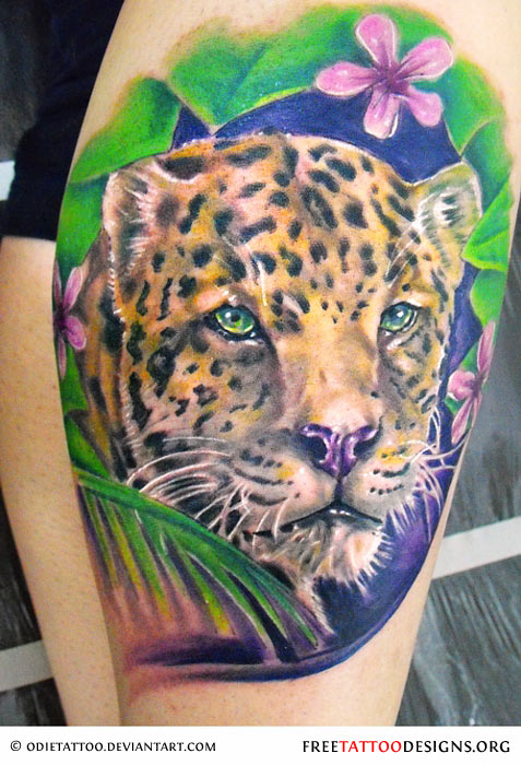 Beautiful Jaguar Face With Flowers Colored Tattoo On Thigh