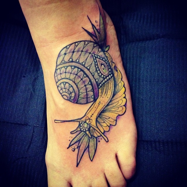 Beautifuly Patterned Snail Tattoo On Foot