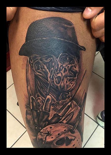 Black And Grey Freddy Krueger Tattoo On Thigh