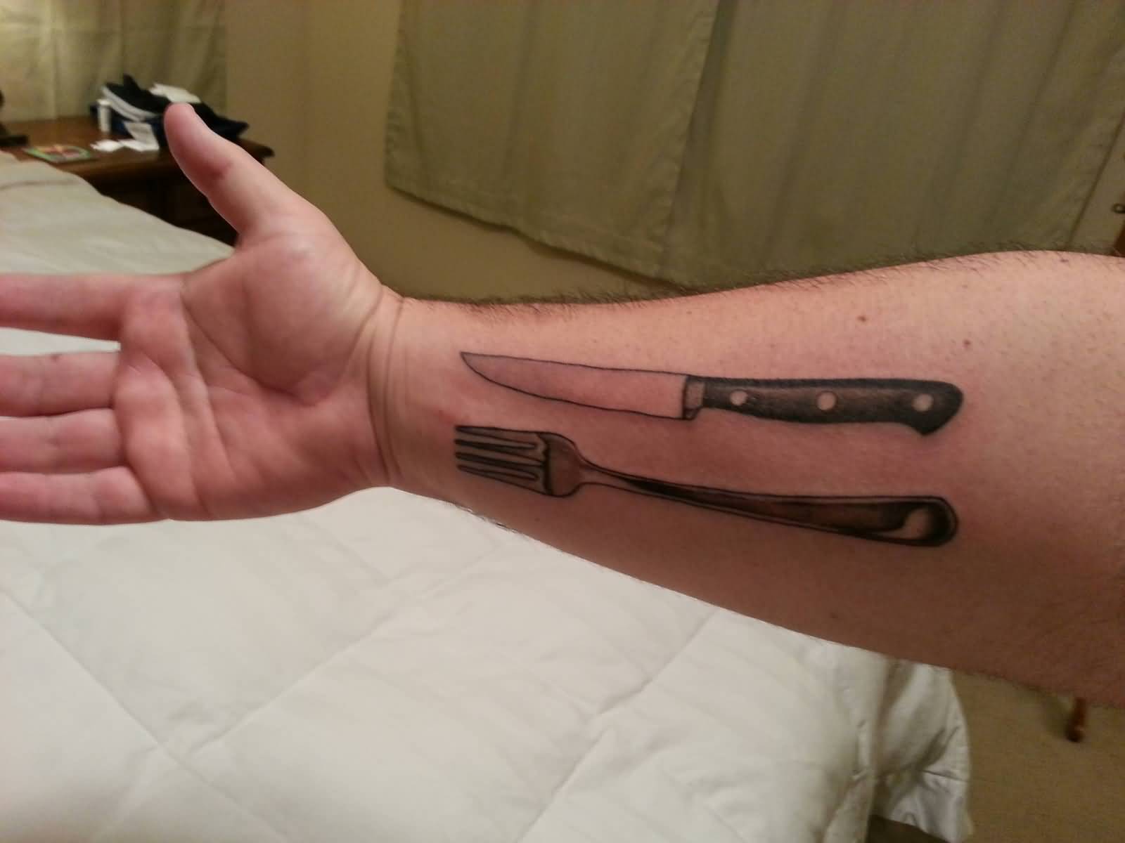 Black And Grey Knife With Fork Tattoo On Right Forearm By Terry